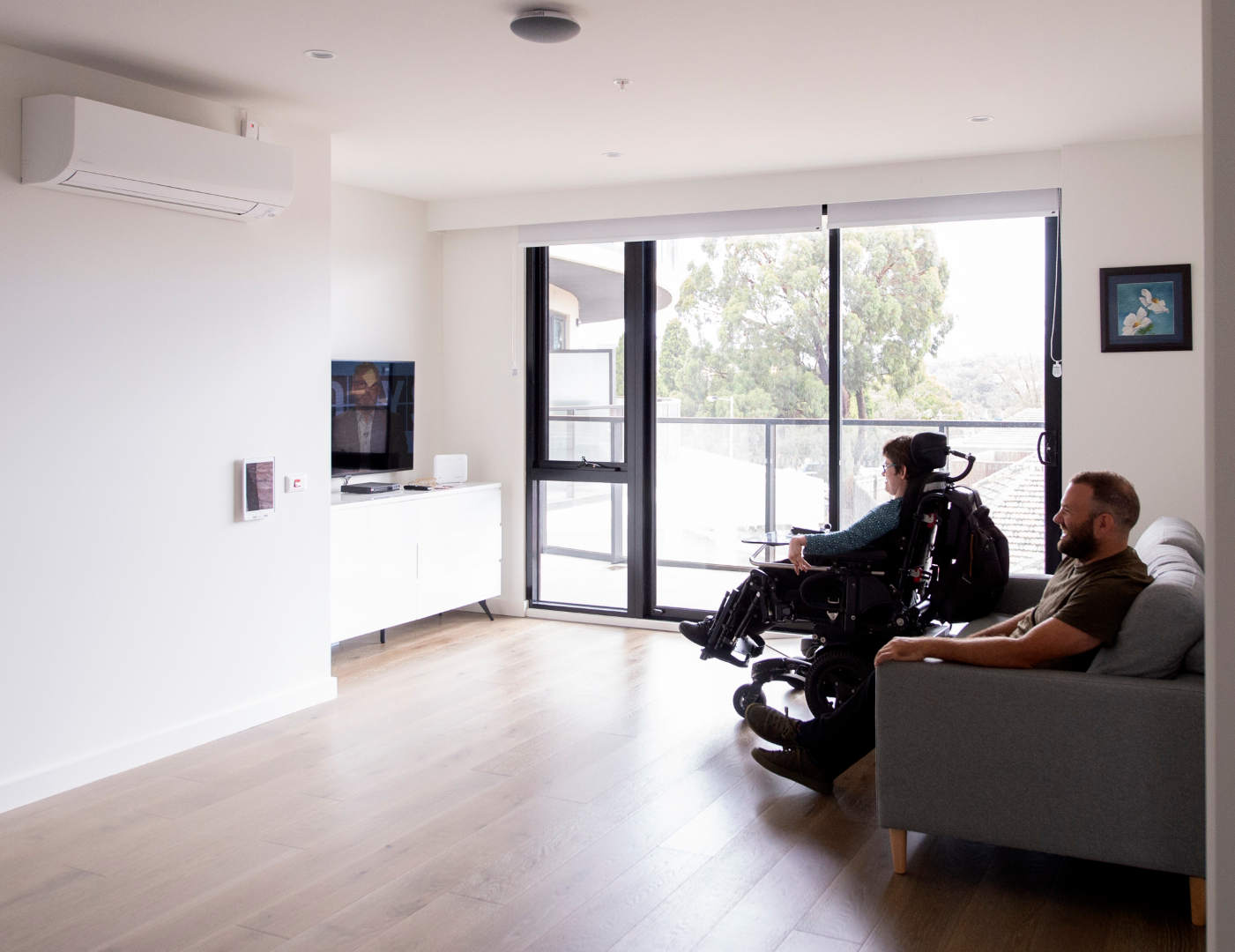 NDIS participant in the living area of an SDA property.